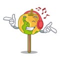 Listening music candy apple mascot cartoon