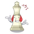 Listening music king chess above wooden cartoon table