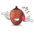 Listening music mascot cartoon of moriche palm fruits