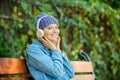 Listening music in park. relax in park. hipster girl with mp3 player. modern technology instead of reading. hipster Royalty Free Stock Photo