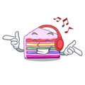 Listening music rainbow cake in the cartoon shape Royalty Free Stock Photo