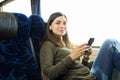 Listening To Music On Her Bus Trip Royalty Free Stock Photo