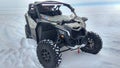 Listvyanka, Russia - February 29, 2020: Buggy car stands in the snow. Open frame of the vehicle for expeditions.