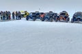 Listvyanka, Russia - February 29, 2020: Buggy cars stand on the ice of Lake Baikal.