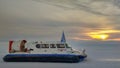 Listvyanka, Russia - February 29, 2020: A hovercraft stands on the ice of Lake Baikal at sunset.