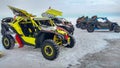 Listvyanka, Russia - February 29, 2020: Many buggy cars stand in rows on the ice of Lake Baikal.