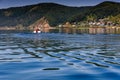 Listvyanka, Russia - July 17, 2019: Lake Baikal close to village Port Baikal, Russia. Horizontal day view of the high Royalty Free Stock Photo