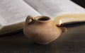 Lit Ancient Oil Lamp with an Open Bible Thy Word is a Lamp Unto My Feet Royalty Free Stock Photo