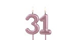 Lit birthday candle - Candle number 31 on white background