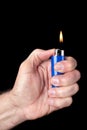 Lit butane lighter Royalty Free Stock Photo