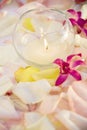 Lit candle with flowers. Royalty Free Stock Photo