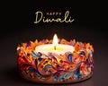 A lit candle with the words happy diwali written on it