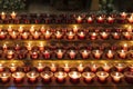 Lit candles in a Catholic Church of Santiago de Compostela, Galicia, Spain. Royalty Free Stock Photo