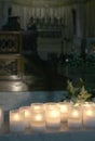 lit candles inside a church Royalty Free Stock Photo