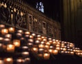 Lit Candles inside church Notre Dame de Paris, France Royalty Free Stock Photo