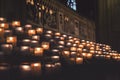 Lit Candles inside church Notre Dame de Paris, France Royalty Free Stock Photo