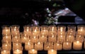 Lit candles to pray inside a church Royalty Free Stock Photo