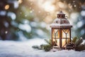 Lit Christmas lantern under the Christmas tree in the snow, covered with snow at night outdoors. Christmas mood. Selective focus.