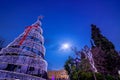 Lit Christmas tree in Syntagma square in Athens, Greece with parliament building. Royalty Free Stock Photo