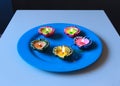 Lit Diyas placed on plate to celebrate deepavali