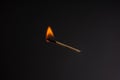 Lit falling match on a black background Royalty Free Stock Photo