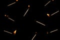 Lit falling match on a black background Royalty Free Stock Photo