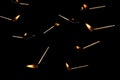 Lit falling match on a black background Royalty Free Stock Photo