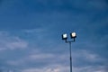 Lit Floodlights in Early Evening