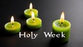 a lit green candle and the text holy week written in w ai generated Royalty Free Stock Photo