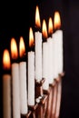 Lit hanukkah menorah on black background. Royalty Free Stock Photo