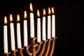 Lit hanukkah menorah black background. Royalty Free Stock Photo