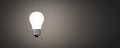 lit light bulb on dark background 3d render illustration Royalty Free Stock Photo