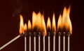 Matches lighting in a row Royalty Free Stock Photo