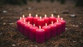 Lit Red Candles on Ground Royalty Free Stock Photo