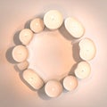 Lit Tealight Candles Forming a Circular Frame on a Soft Background Royalty Free Stock Photo