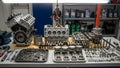 Lit workshop displays disassembled engine components on a table Royalty Free Stock Photo
