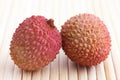 Litchis on bamboo matt. Detail Royalty Free Stock Photo