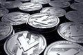 Litecoin coins LTC in blurry closeup. New cryptocurrency and modern banking concept. Royalty Free Stock Photo