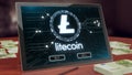 Litecoin cryptocurrency logo on the pc tablet, 3D illustration