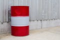 200 liter red and white fuel tank on white wall