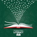 Literacy Day card concept open book and alphabet