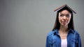 Literature lover with book on head looking aside, list of recommended novels