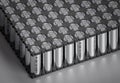 Lithium-ion batteries form a battery pack utilized in electric vehicles. 3d render