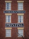 Lithographers printing building sign Royalty Free Stock Photo