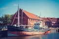 LITHUANIA, KLAIPEDA - JULY 20, 2016: boat on Dane river in oldtown of Klaipeda. Lithuania.