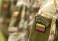 Lithuania patch flag on soldiers arm. Lithuanian military uniform. Lithuania troops Royalty Free Stock Photo