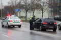 In Lithuania, the police have begun to restrict movement between municipalities, and the police check residents` documents when Royalty Free Stock Photo