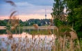 Lithuanian landscape of lake and tv tower visible Royalty Free Stock Photo