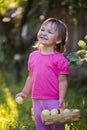 Litle girl with apples Royalty Free Stock Photo