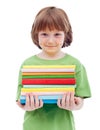 Litlle boy with freckles holding books Royalty Free Stock Photo